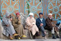 Men chatting in the evening at Chefchauen